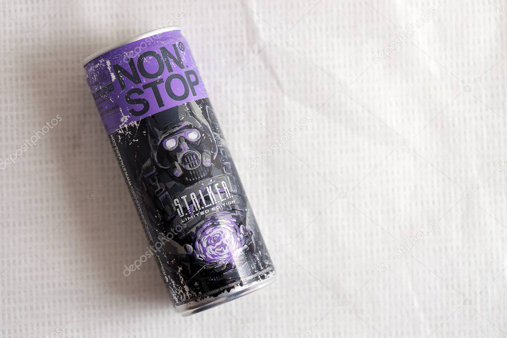 KYIV, UKRAINE - APRIL 19, 2025 Non Stop energy drink with limited edition design of Stalker and character with gas mask on aluminium can close up