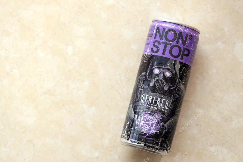 KYIV, UKRAINE - APRIL 19, 2025 Non Stop energy drink with limited edition design of Stalker and character with gas mask on aluminium can close up