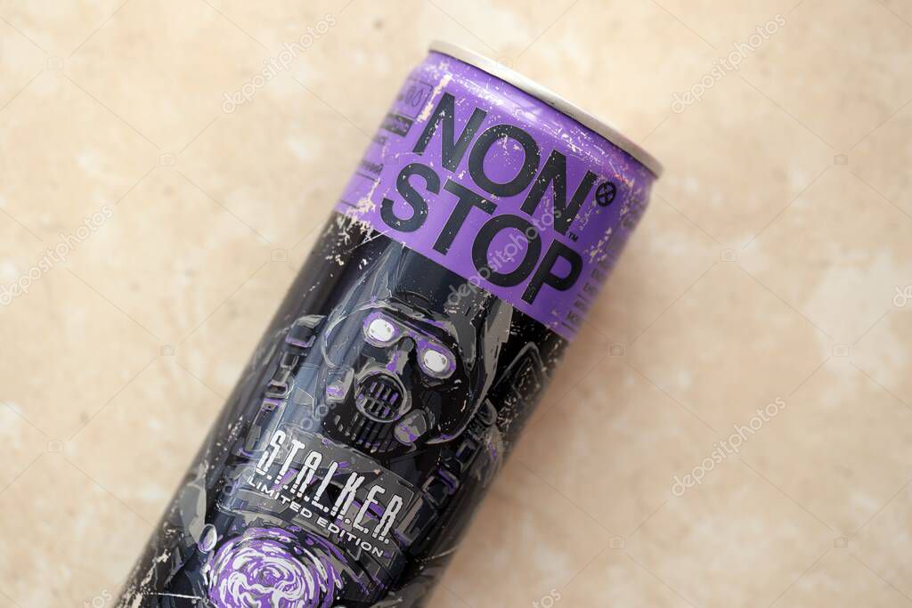 KYIV, UKRAINE - APRIL 19, 2025 Non Stop energy drink with limited edition design of Stalker and character with gas mask on aluminium can close up