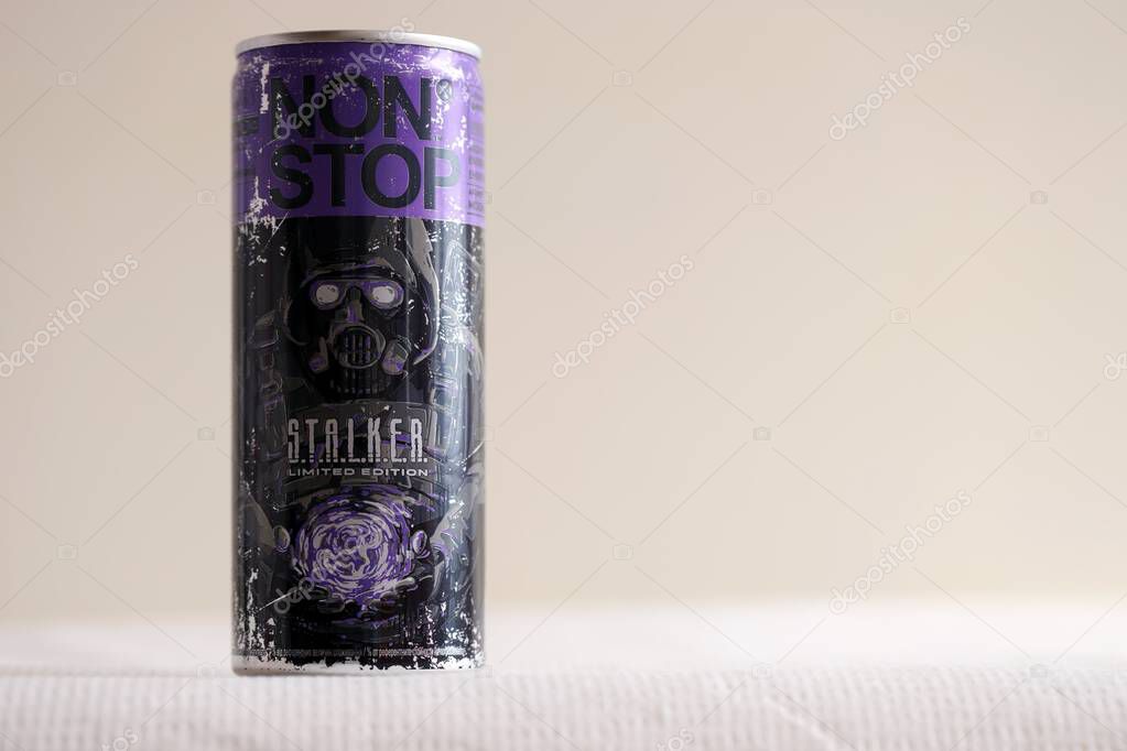 KYIV, UKRAINE - APRIL 19, 2025 Non Stop energy drink with limited edition design of Stalker and character with gas mask on aluminium can close up