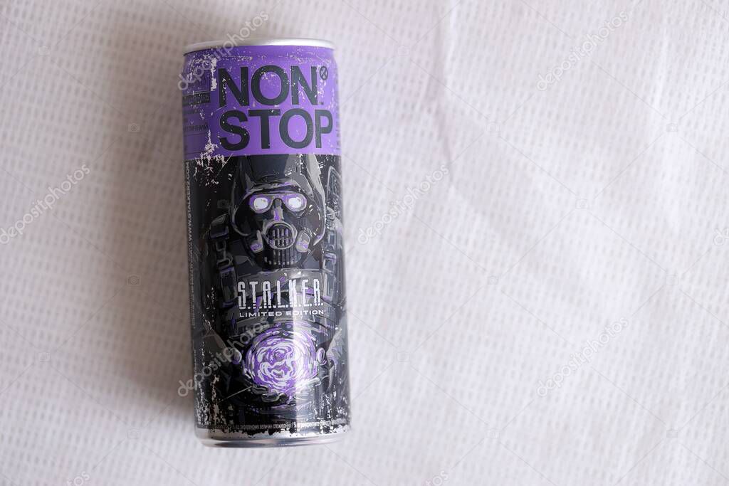 KYIV, UKRAINE - APRIL 19, 2025 Non Stop energy drink with limited edition design of Stalker and character with gas mask on aluminium can close up