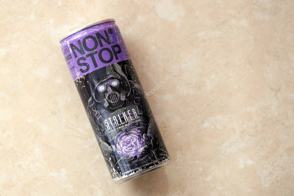 KYIV, UKRAINE - APRIL 19, 2025 Non Stop energy drink with limited edition design of Stalker and character with gas mask on aluminium can close up