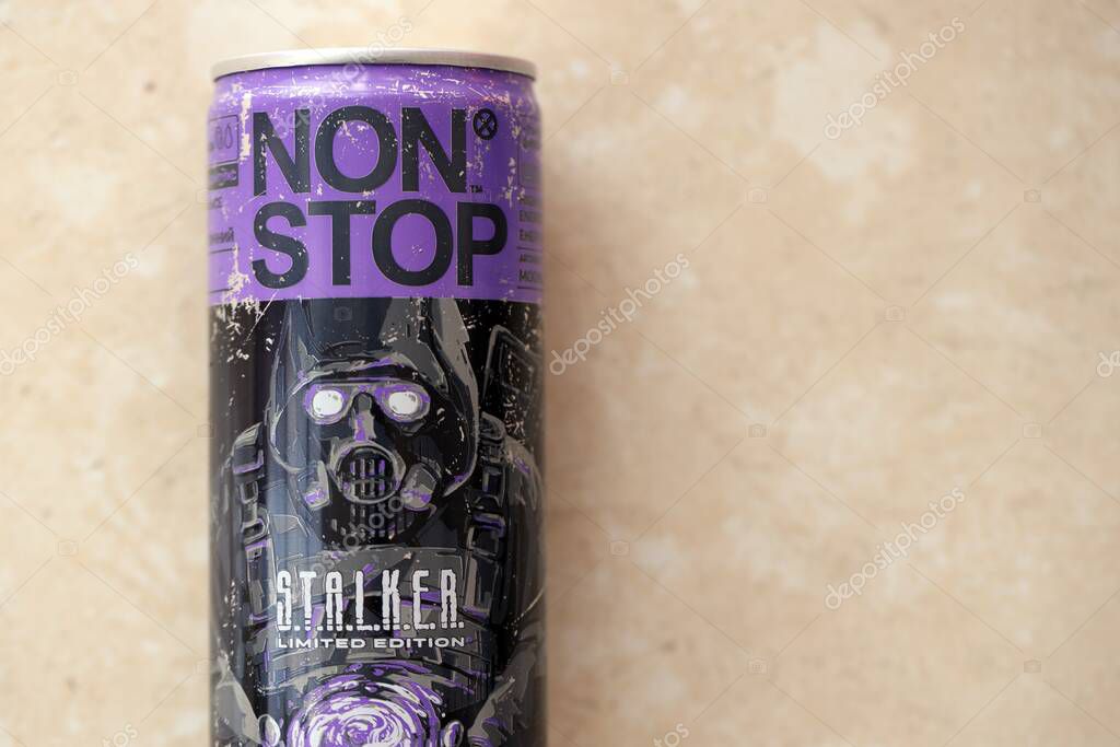KYIV, UKRAINE - APRIL 19, 2025 Non Stop energy drink with limited edition design of Stalker and character with gas mask on aluminium can close up