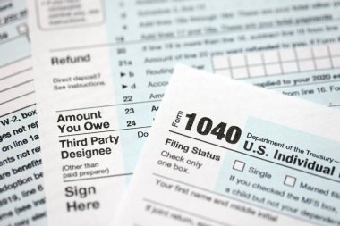 1040 ABD bireysel gelir vergi iade formu yakın çekim. Birleşik Devletler 'in birkaç sayfası vergiden muaf. ABD 'de vergi ödeme ve muhasebe kavramı