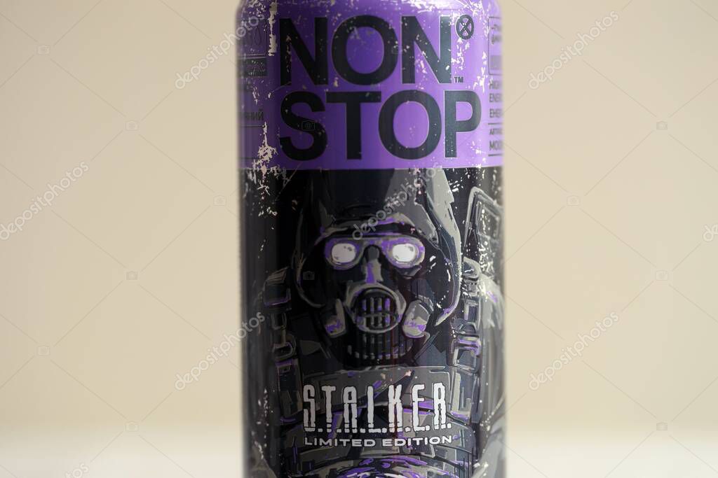 KYIV, UKRAINE - APRIL 19, 2025 Non Stop energy drink with limited edition design of Stalker and character with gas mask on aluminium can close up