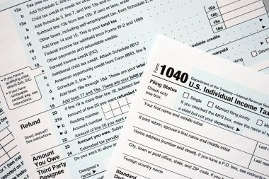 1040 ABD bireysel gelir vergi iade formu yakın çekim. Birleşik Devletler 'in birkaç sayfası vergiden muaf. ABD 'de vergi ödeme ve muhasebe kavramı