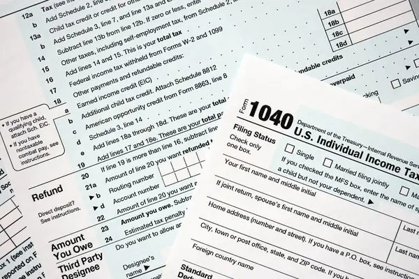 1040 ABD bireysel gelir vergi iade formu yakın çekim. Birleşik Devletler 'in birkaç sayfası vergiden muaf. ABD 'de vergi ödeme ve muhasebe kavramı