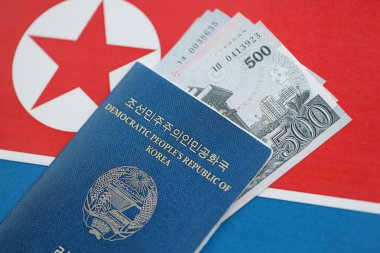 Kuzey Kore büyük miktarlarda para kazandı ve pasaport Kore Halk Cumhuriyeti bayrağına yakın duruyor. Finans ve bankacılık kavramı