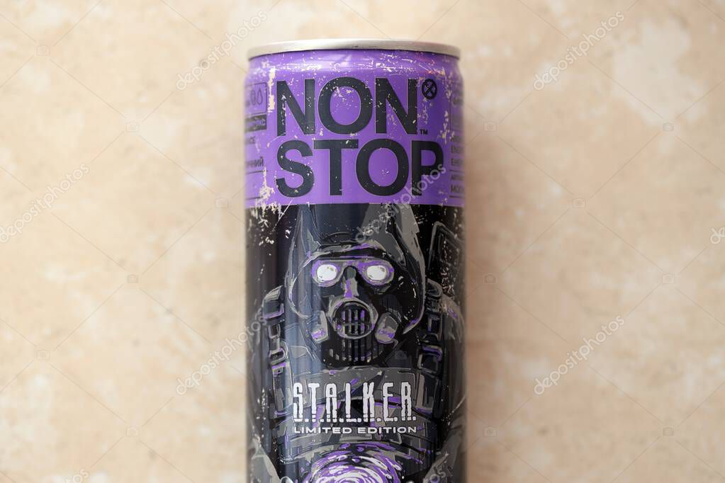KYIV, UKRAINE - APRIL 19, 2025 Non Stop energy drink with limited edition design of Stalker and character with gas mask on aluminium can close up