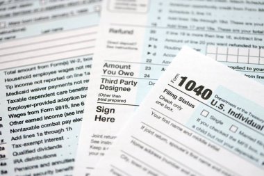 1040 ABD bireysel gelir vergi iade formu yakın çekim. Birleşik Devletler 'in birkaç sayfası vergiden muaf. ABD 'de vergi ödeme ve muhasebe kavramı