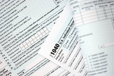 1040 ABD bireysel gelir vergi iade formu yakın çekim. Birleşik Devletler 'in birkaç sayfası vergiden muaf. ABD 'de vergi ödeme ve muhasebe kavramı