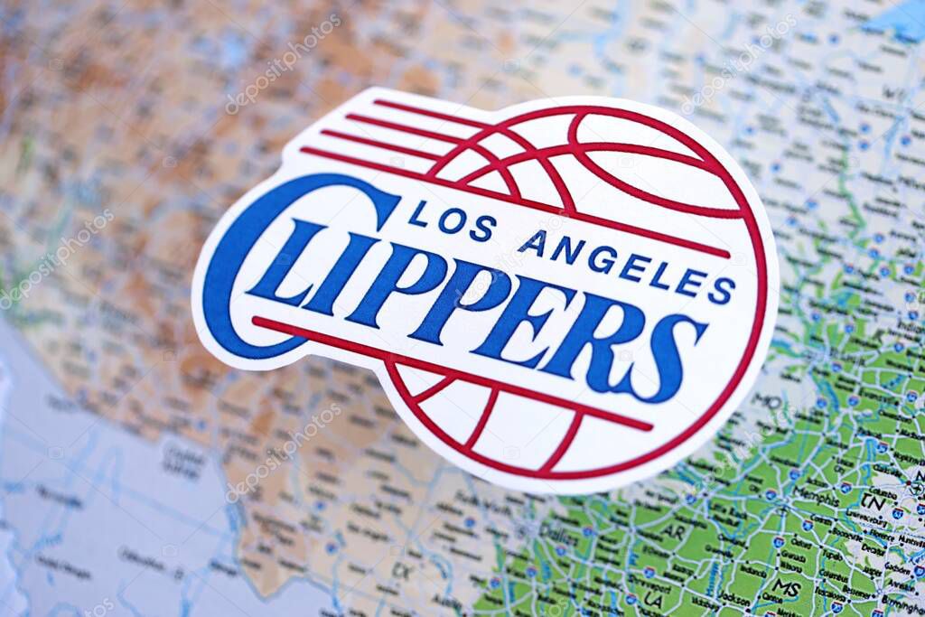 KYIV, UKRAINE - FEBRUARY 23, 2025 Los Angeles Clippers basketball team badge lies on USA map background banner