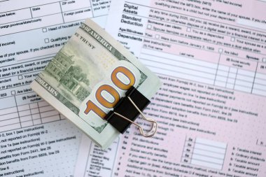 Birleşik Devletler dolarlarının büyük bir kısmı bireysel gelir vergisi iadesi formlarıyla masaya yatırıldı. ABD 'de vergilendirme ve muhasebe kavramı