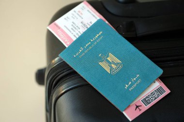 Egyptian passport and avia tickets on travel bag close up. The concept of travel and vacation