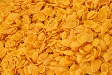 Mısır gevreği arkaplanı yakın plan. Sabah kahvaltısı için mısır gevreği kutusu.