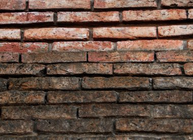 Yıpranmış tuğla duvar dokusu kumla