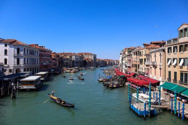 Venice, Italy, 11. June 2022: Gondola and Canal Grande from Rialto Bridge.