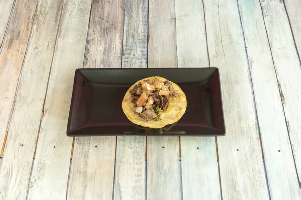 Taco from Mexico, a particular cut of beef that comes from the animal\'s rib is called arrachera