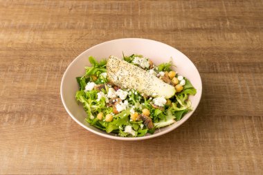 A healthy mixed bean salad with chickpeas, Greek cheese and a boiled potato