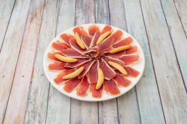 Great portion of Iberian ham with croutons which is one of the most typical tapas in Spanish bars