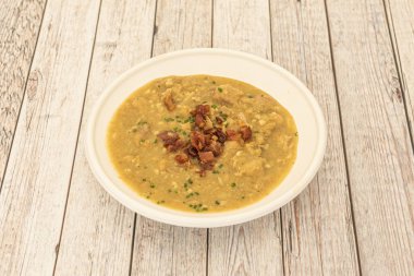 Pepitoria is a Spanish way of cooking different meat dishes, usually with chicken. The juices obtained from the preparation of the meat are enriched with hard-boiled egg yolk and ground almonds