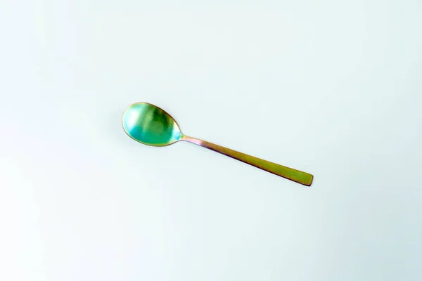 虹彩材料のサラダスプーン — ストック写真