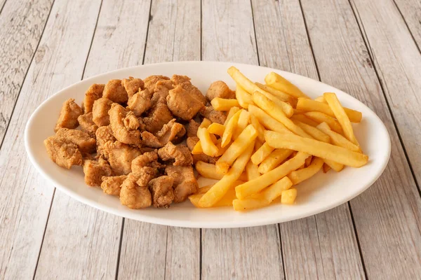 Popcorn chicken is a dish consisting of small bite-sized pieces of chicken that have been breaded and deep-fried