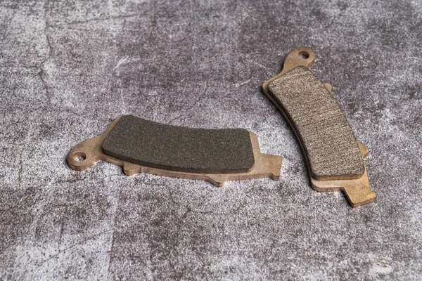 Brake pads are a component of disc brakes or rim brakes, used in automotive and other applications. Brake pads are made up of steel backing plates with friction material bonded to the surface