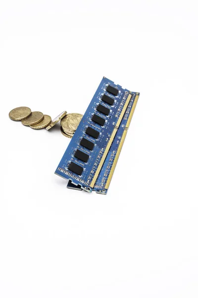 Some ddr3 ram memory modules without heat sinks on some euro dividing coins