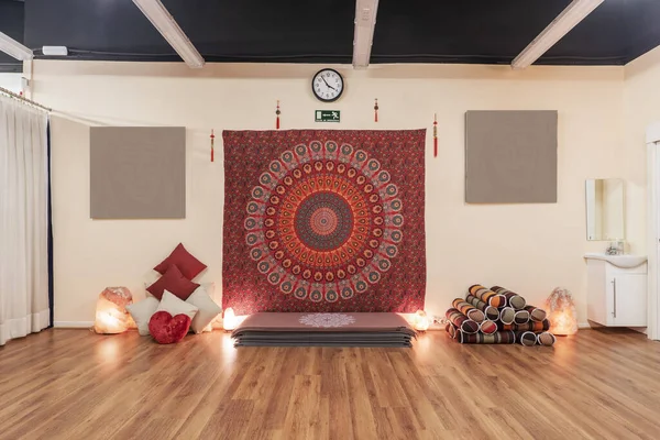 A room in a complex where they give relaxing yoga classes