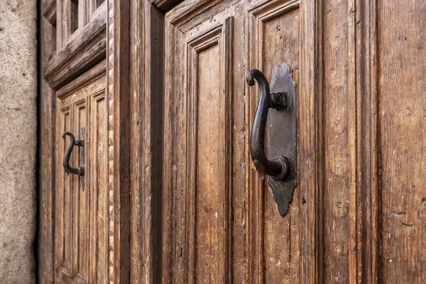 Old wooden access doors to a vintage building