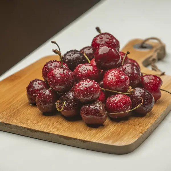 Cherry and sour cherry are the names of the fruit of various trees of the genus Prunus, although a limited number of species are used commercially. The tree is known as cherry tree or guindo