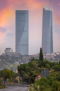 These four towers are an indisputable symbol of the modernity and architectural development of the city of Madrid clipart