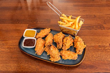  Daha gevrek bir dokuyu tercih edenler için önceden terbiye edilmiş kanatlar kızarabilir.