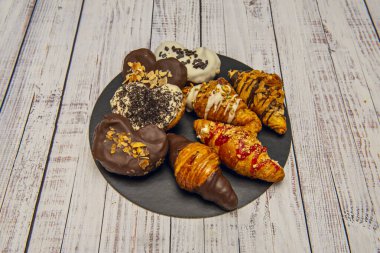 Pek çok şekerin kökeni bilinmemekle birlikte, palmiye ağacı için durum böyle değildir. Palmiye ağacı ilk olarak Fransa 'da yapılan bir uzmanlık alanıdır.