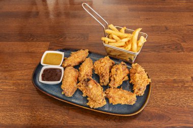  Daha gevrek bir dokuyu tercih edenler için önceden terbiye edilmiş kanatlar kızarabilir.