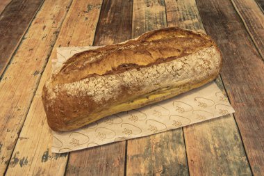 Village bread, also known as country bread or rustic bread, is a variety of loaf made by hand, following recipes passed down from generation to generation clipart