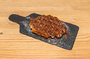 Artisan Belçika waffleları: açık tereyağı ve Madagaskar vanilyasından yapılmış..