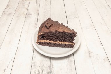 Çikolata ve portakallı pasta, biraz da Grand Marnier ve narenciye. Madalyalı