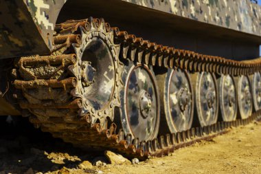 Battlefield tanks and technology. military technology. Wide image for banners, advertisements. Caterpillars in close-up. clipart