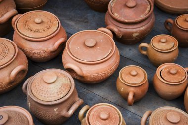 Clay jars at the rural arabic market clipart