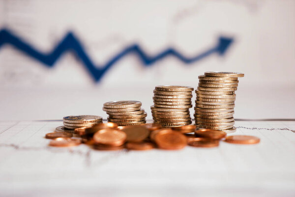 Бизнес-диаграмма финансового отчета с монетами