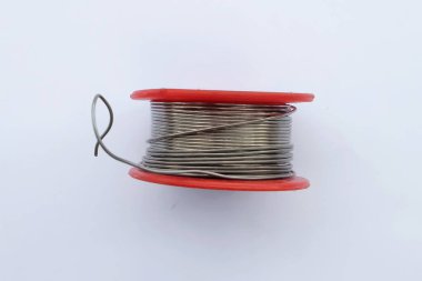 Tin roller for soldering equipment on white background