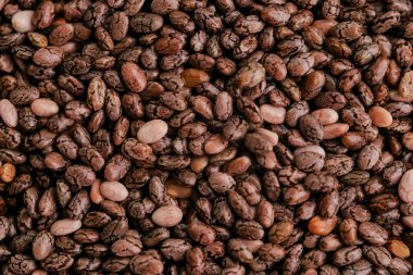 Pile of chia seeds as background, Macro shot