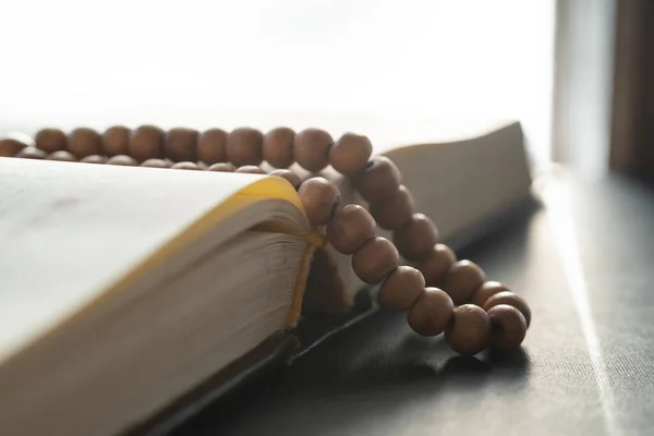 Holy book and prayer beads for Muslims. concept of the Koran and prayer beads