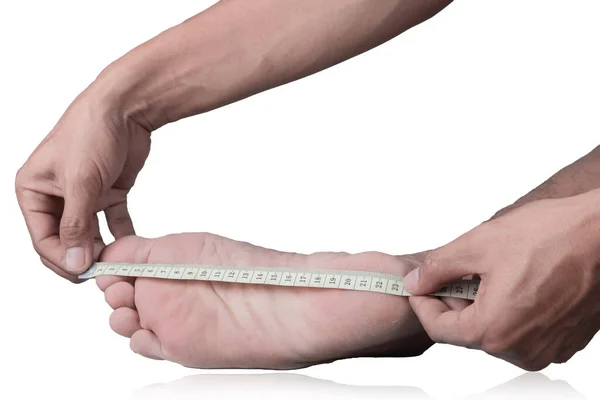 Крупный План Человека Измеряющего Размер Ноги Помощью Измерительной Ленты Белом — стоковое фото