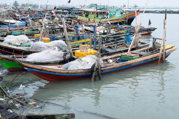 stock image Rows of fishing net boats parked at a fish auction in Indonesia