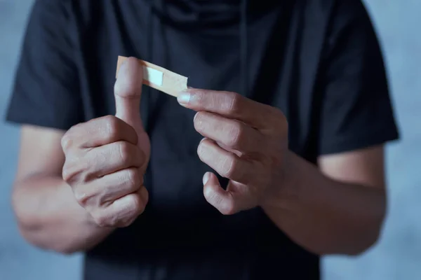 Man Placing Bandage Adhesive Plaster His Thumb Finger Plaster Wound — Stock Photo, Image