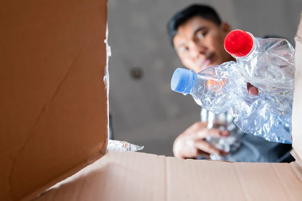 Man Collects Puts Recyclable Plastic Bottles Cardboard Box — Stock Photo, Image