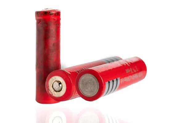 Different Alkaline Batteries Standing White Surface Macro Shot — Stock Photo, Image
